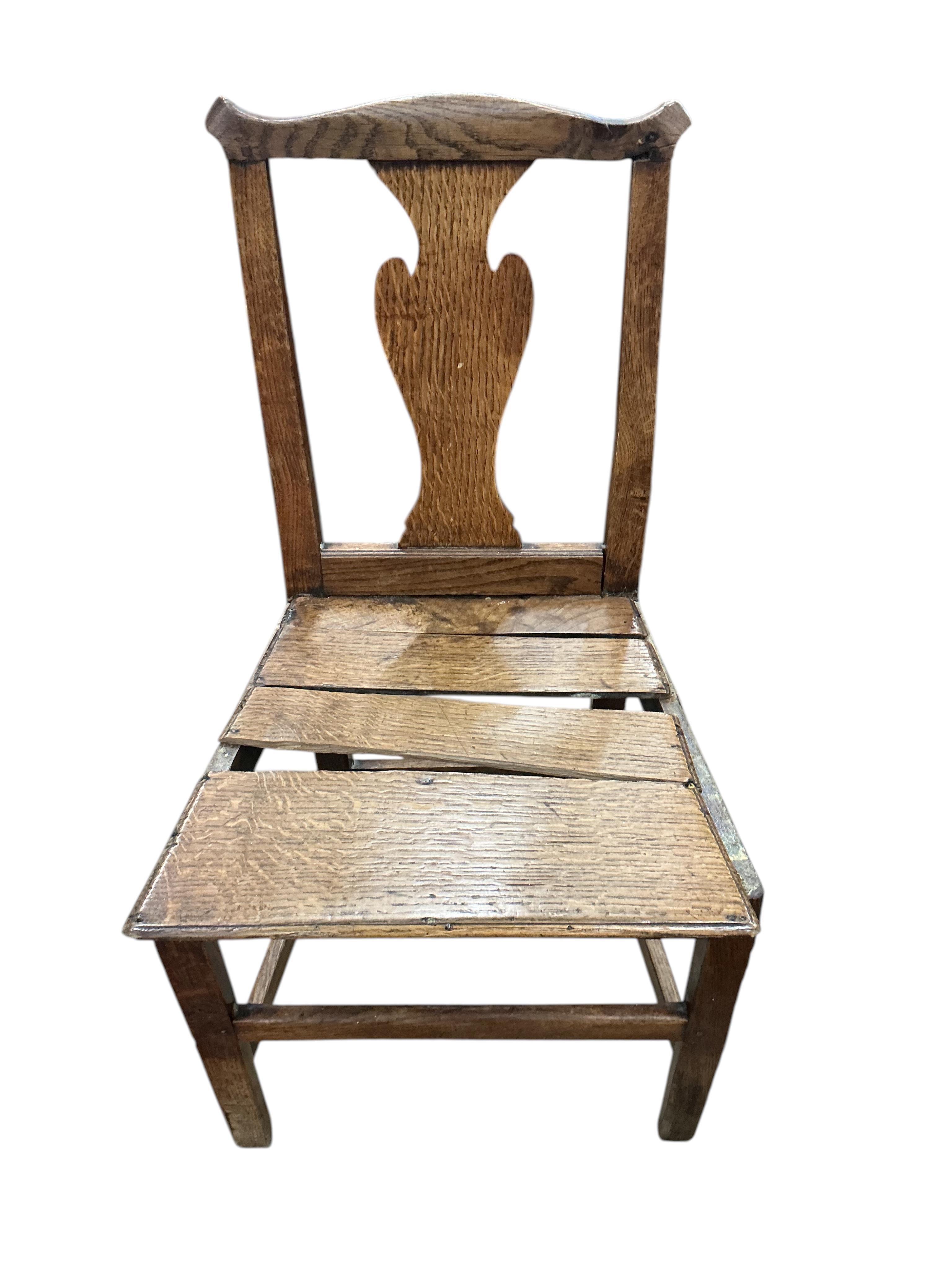 A harlequin set of six George III Provincial oak wood seat dining chairs